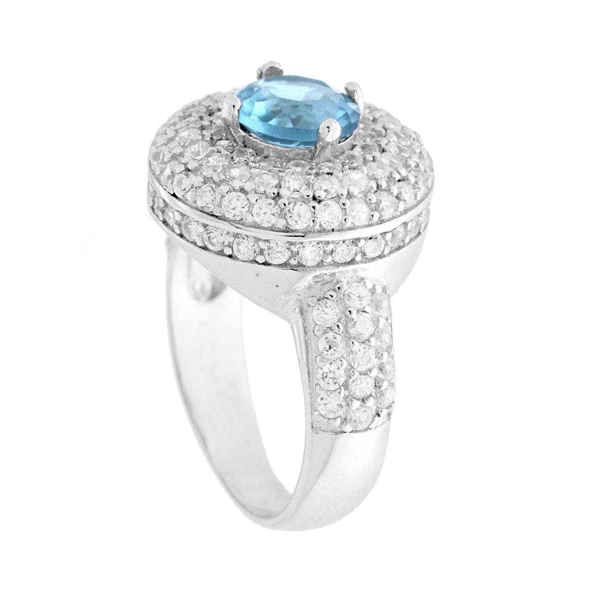Anello con Pietra Naturale Acquamarina contornata da Cubic Zirconia Bianchi in ARGENTO 925 Galvanica Rodio